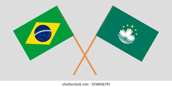 Gekreuzte Flaggen von Brasilien und Macau. Offizielle Farben. Richtiger Anteil