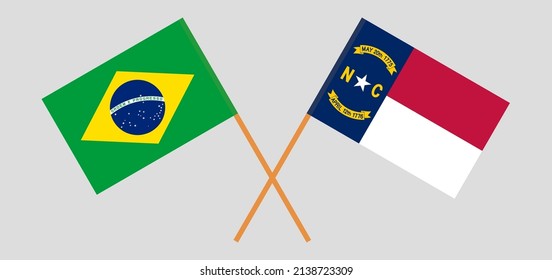 Crossed flags of Brazil and The State of North Carolina. Official colors. Correct proportion. Vector illustration
