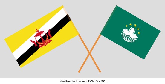 Crossed flags of Brunei and Macau. Official colors. Correct proportion