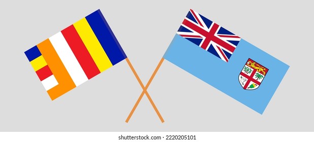 Crossed flags of Buddhism and Fiji. Official colors. Correct proportion. Vector illustration
