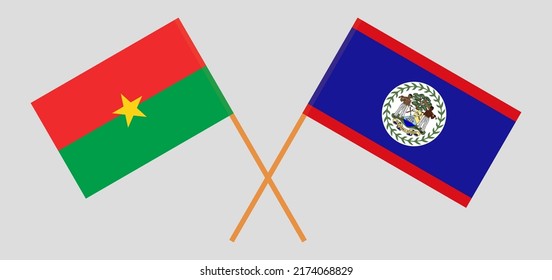 Überkreuzte Flaggen von Burkina Faso und Belize. Offizielle Farben. Richtiger Anteil. Vektorgrafik