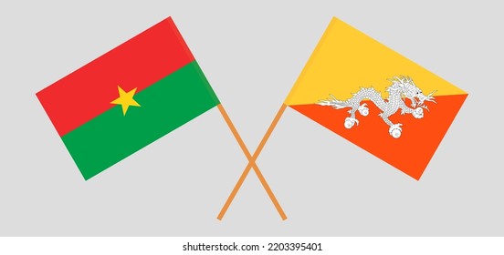 Gekreuzte Flaggen von Burkina Faso und Bhutan. Offizielle Farben. Richtiger Anteil. Vektorgrafik
