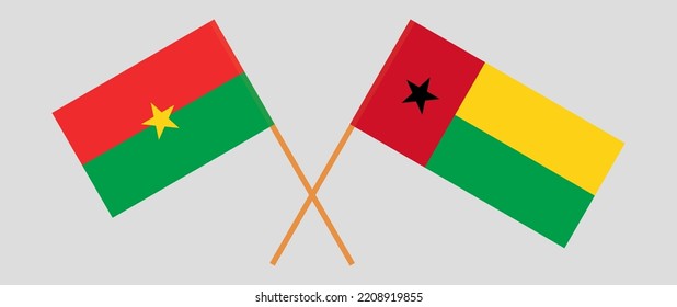 Gekreuzte Flaggen von Burkina Faso und Guinea-Bissau. Offizielle Farben. Richtiger Anteil. Vektorgrafik
