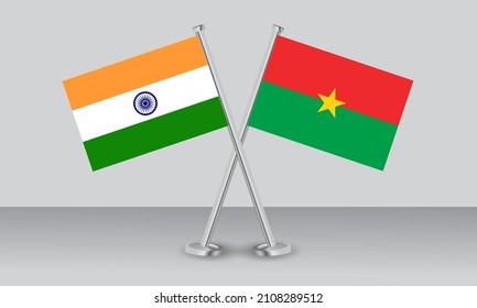 Gekreuzte Flaggen von Burkina Faso und Indien. Offizielle Farben. Richtiger Anteil. Banner-Design