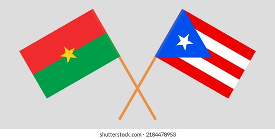 Gekreuzte Flaggen von Burkina Faso und Puerto Rico. Offizielle Farben. Richtiger Anteil. Vektorgrafik
