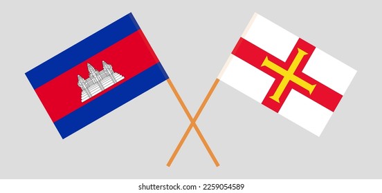 Crossed flags of Cambodia and Bailiwick of Guernsey. Official colors. Correct proportion. Vector illustration
