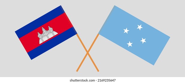 Crossed flags of Cambodia and Micronesia. Official colors. Correct proportion. Vector illustration
