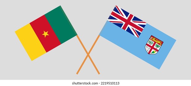 Crossed flags of Cameroon and Fiji. Official colors. Correct proportion. Vector illustration
