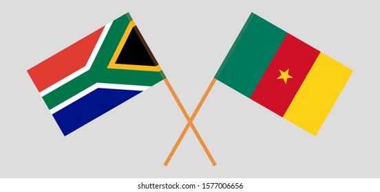Crossed flags of Cameroon and the RSA. Official colors. Correct proportion. Vector illustration
