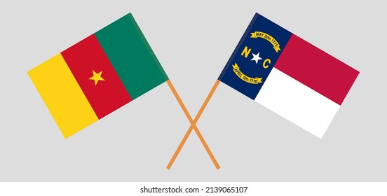 Crossed flags of Cameroon and The State of North Carolina. Official colors. Correct proportion. Vector illustration
