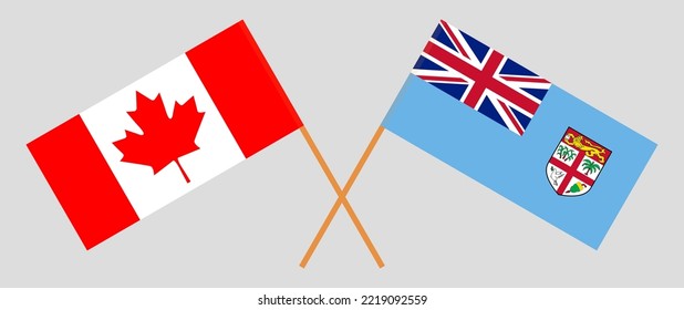 Crossed flags of Canada and Fiji. Official colors. Correct proportion. Vector illustration
