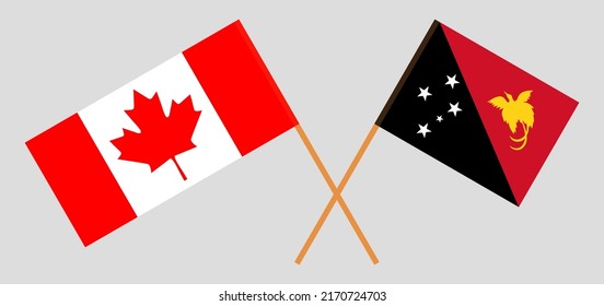 Crossed flags of Canada and Papua New Guinea. Official colors. Correct proportion. Vector illustration
