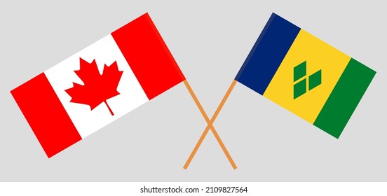 Crossed flags of Canada and Saint Vincent and the Grenadines. Official colors. Correct proportion. Vector illustration
