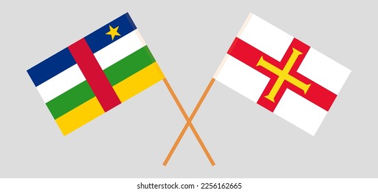Crossed flags of Central African Republic and Bailiwick of Guernsey. Official colors. Correct proportion. Vector illustration
