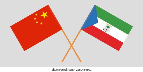 Gekreuzte Flaggen von China und Äquatorialguinea. Offizielle Farben. Richtiger Anteil. Vektorgrafik
