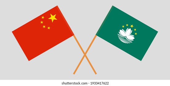 Crossed flags of China and Macau. Official colors. Correct proportion
