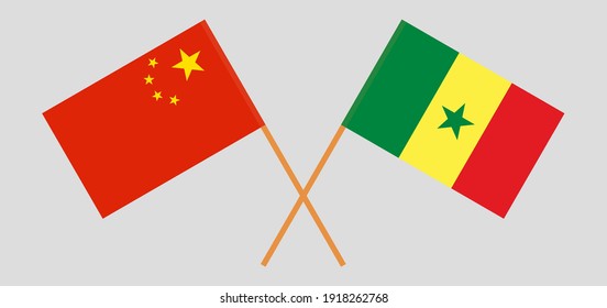 Crossed flags of China and Senegal