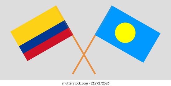 Crossed flags of Colombia and Palau. Official colors. Correct proportion. Vector illustration