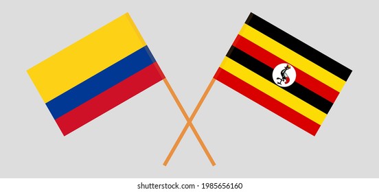 Crossed flags of Colombia and Uganda. Official colors. Correct proportion