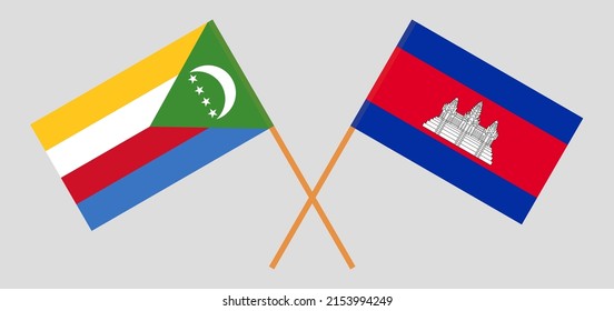 Crossed flags of the Comoros and Cambodia. Official colors. Correct proportion. Vector illustration

