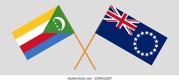 Banderas cruzadas de las Comoras y las Islas Cook. Colores oficiales. Proporción correcta. Ilustración del vector
