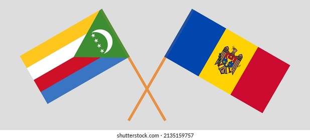 Banderas cruzadas de las Comoras y Moldavia. Colores oficiales. Proporción correcta. Ilustración del vector
