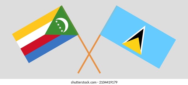 Crossed flags of the Comoros and Saint Lucia. Official colors. Correct proportion. Vector illustration
