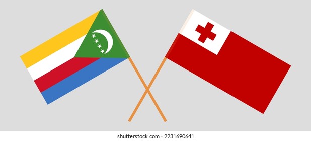 Crossed flags of the Comoros and Tonga. Official colors. Correct proportion. Vector illustration

