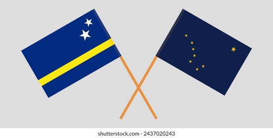 Crossed flags of Country of Curacao and the State of Alaska. Official colors. Correct proportion. Vector illustration
