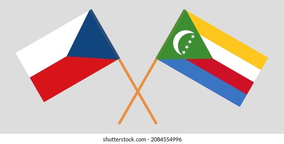 Gekreuzte Flaggen der Tschechischen Republik und der Komoren. Offizielle Farben. Richtiger Anteil. Vektorgrafik
