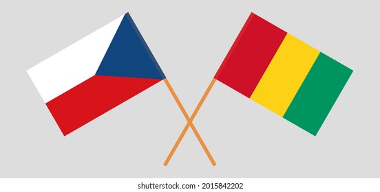 Banderas cruzadas de la República Checa y Guinea. Colores oficiales. Proporción correcta