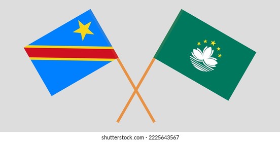 Banderas cruzadas de la República Democrática del Congo y Macao. Colores oficiales. Proporción correcta. Ilustración del vector
