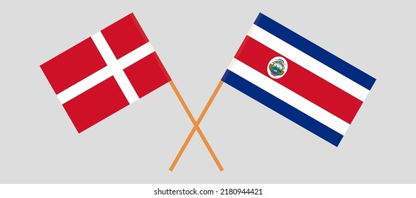 Crossed flags of Denmark and Costa Rica. Official colors. Correct proportion. Vector illustration
