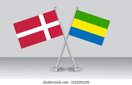 Crossed flags of Denmark and Gabon. Official colors. Correct proportion. Banner design