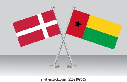Crossed flags of Denmark and Guinea Bissau. Official colors. Correct proportion. Banner design