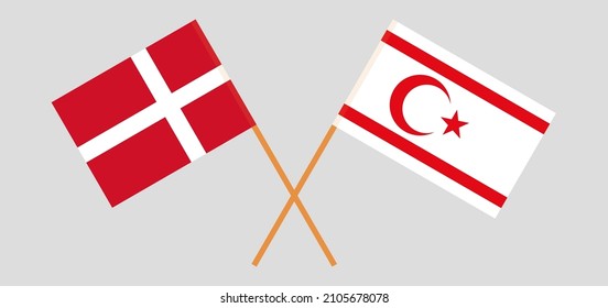 Crossed flags of Denmark and Northern Cyprus. Official colors. Correct proportion. Vector illustration
