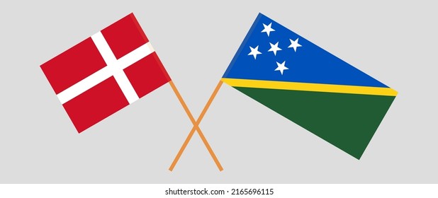Crossed flags of Denmark and Solomon Islands. Official colors. Correct proportion. Vector illustration
