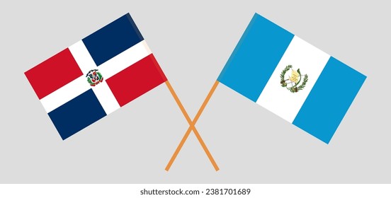 Crossed flags of Dominican Republic and Guatemala. Official colors. Correct proportion. Vector illustration
