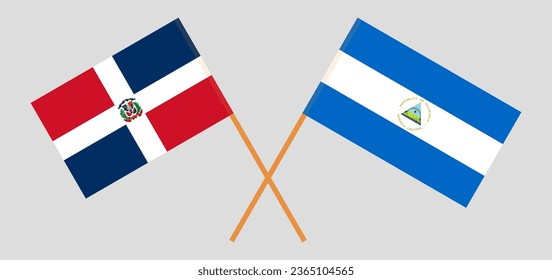 Crossed flags of Dominican Republic and Nicaragua. Official colors. Correct proportion. Vector illustration
