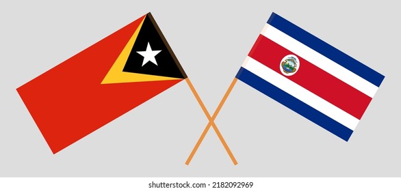 Crossed flags of East Timor and Costa Rica. Official colors. Correct proportion. Vector illustration
