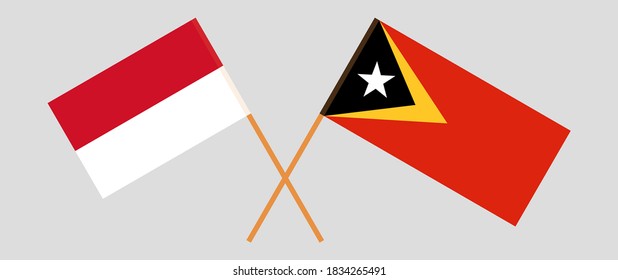 Crossed flags of East Timor and Indonesia