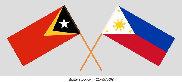 Crossed flags of East Timor and the Philippines. Official colors. Correct proportion. Vector illustration
