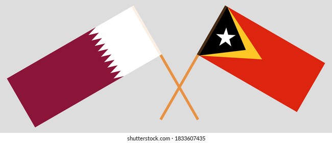 Crossed flags of East Timor and Qatar
