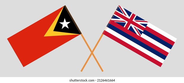 Crossed flags of East Timor and The State Of Hawaii. Official colors. Correct proportion. Vector illustration
