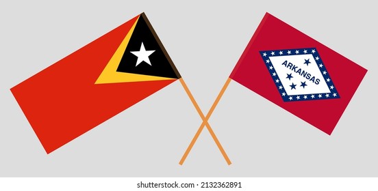 Crossed flags of East Timor and The State of Arkansas. Official colors. Correct proportion. Vector illustration
