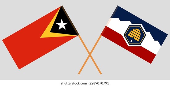 Crossed flags of East Timor and The State of Utah. Official colors. Correct proportion. Vector illustration
