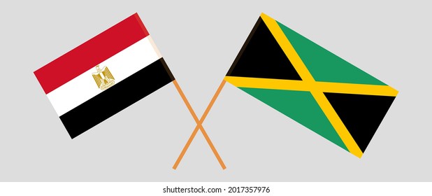 Banderas cruzadas de Egipto y Jamaica. Colores oficiales. Proporción correcta