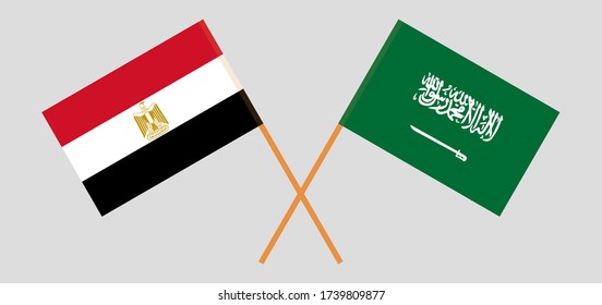 Banderas cruzadas de Egipto y el Reino de Arabia Saudita