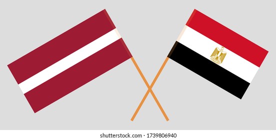 Crossed flags of Egypt and Latvia