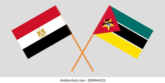 Banderas cruzadas de Egipto y Mozambique. Colores oficiales. Proporción correcta